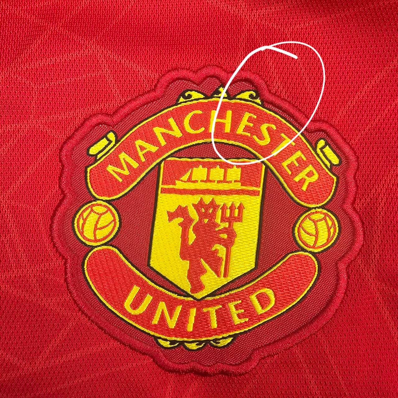 Not genuine Manchester United badge embroidery detail