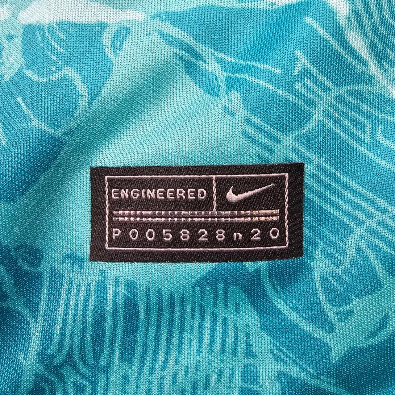 Not genuine Nike shirt front engineered tag showing code P005828n20