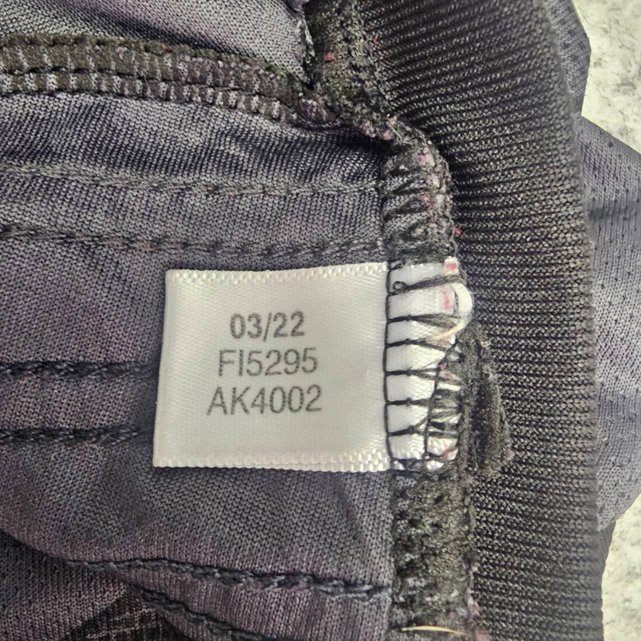 Not genuine Adidas grey shirt code tag showing FI5295